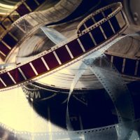 An old film with a movie on the roll.